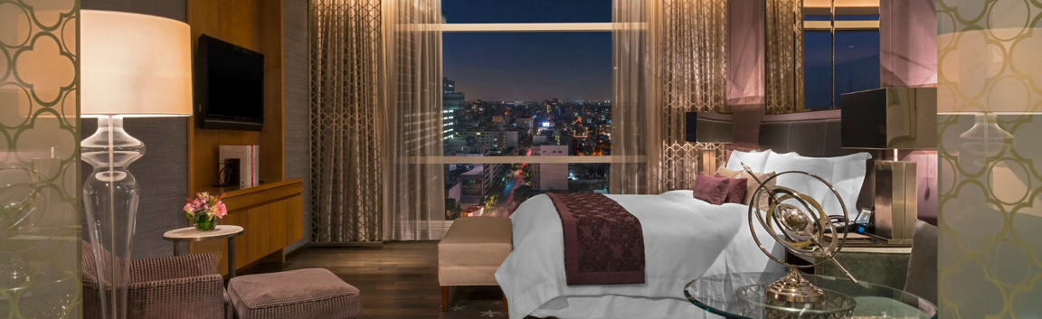 Slider2StRegisMexicoAstorSuiteBedroom.jpg
